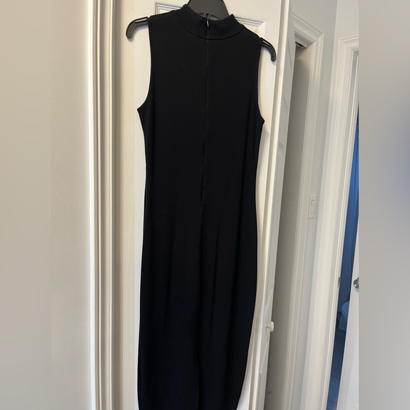 Black stretch pencil dress, high collar with zipper on back seam. - Picture 2 of 3